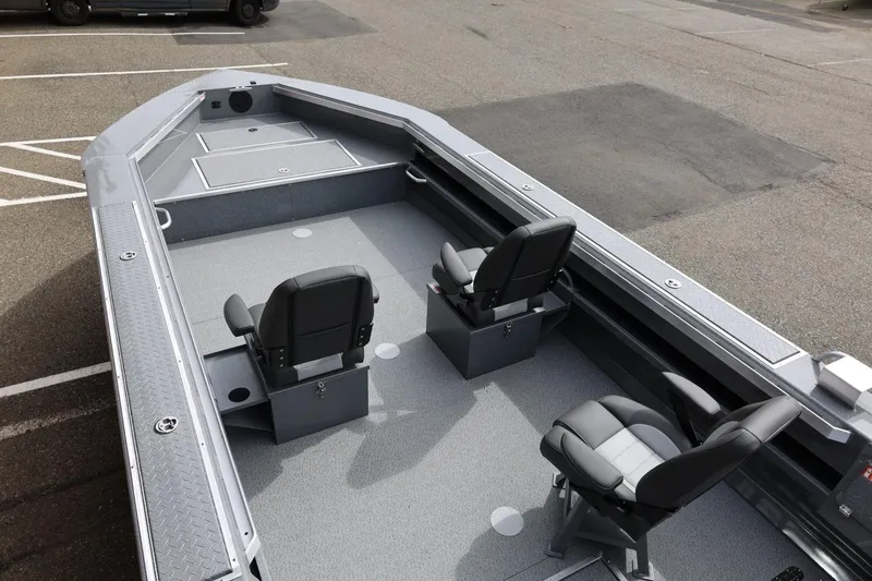 Slide: The Image of 2026 Thunder Jet 209 Rush OT boat interior with seating and storage compartments. - 41