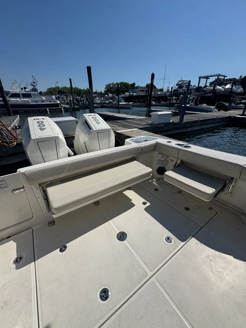 Slide: The Image of Interior of 2024 Boston Whaler 325 Conquest with helm console. - 15