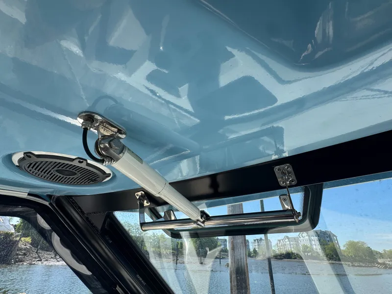 Slide: The Image of Interior view of the 2024 Boston Whaler 325 Conquest boat. - 18