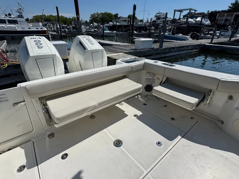 Slide: The Image of Interior of 2024 Boston Whaler 325 Conquest with wooden details. - 28
