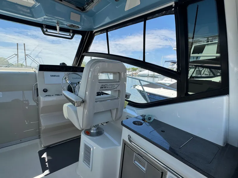 Slide: The Image of 2024 Boston Whaler 325 Conquest with twin Mercury 400 HP engines. - 31