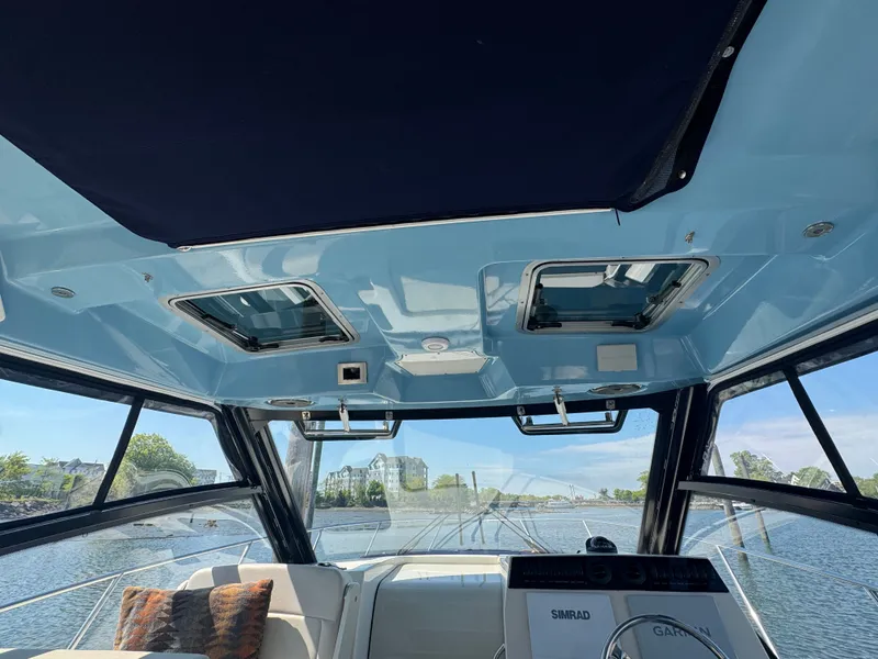 Slide: The Image of Boston Whaler 325 Conquest 2024 with Mercury 400 engines. - 34