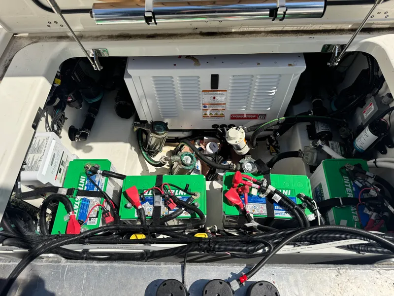Slide: The Image of Battery compartment of 2024 Boston Whaler 325 Conquest boat. - 35
