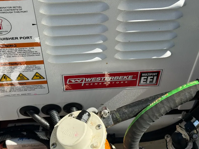 Slide: The Image of Westerbeke generator in 2024 Boston Whaler 325 Conquest boat. - 36