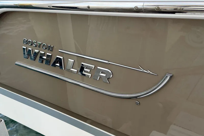 Slide: The Image of Boston Whaler 280 Vantage 2022 logo on boat exterior. - 23