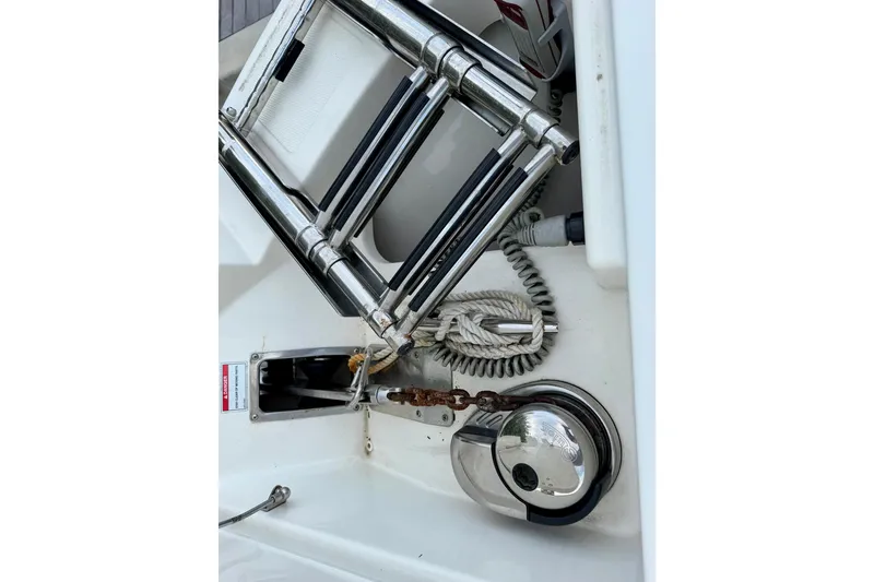 Slide: The Image of 2022 Boston Whaler 280 Vantage boat ladder and anchor chain detail. - 24