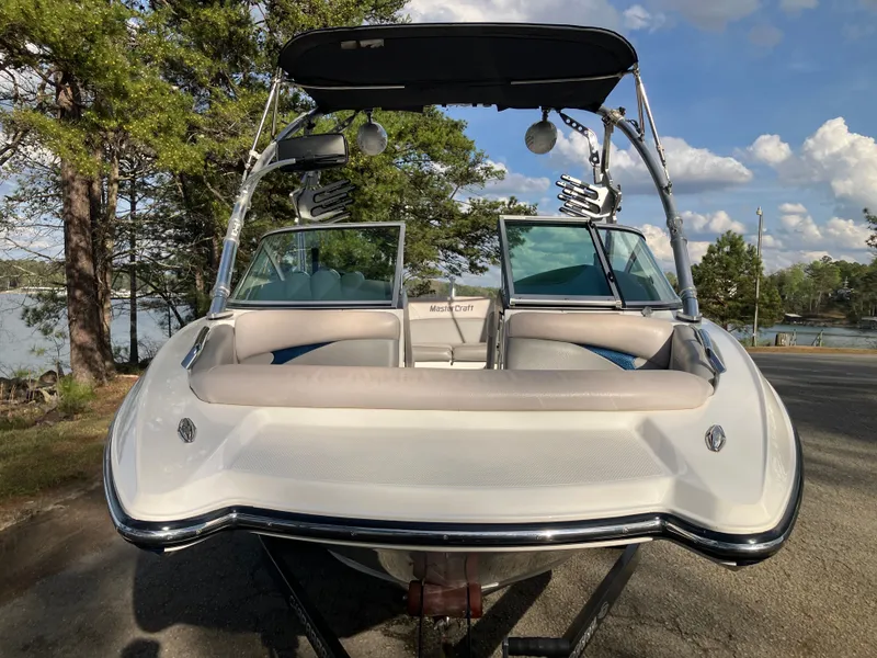 Slide: The Image of 2007 MasterCraft 200 Maristar VRS boat parked by lakeside. - 2