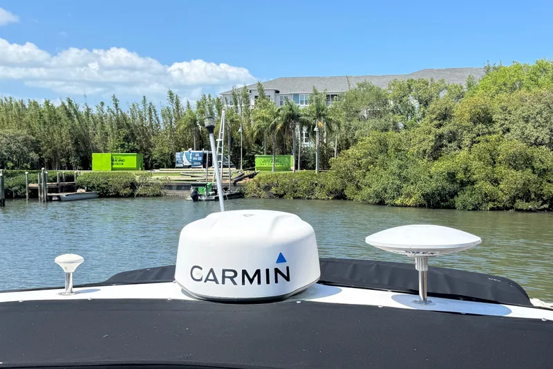 Slide: The Image of 2002 Sea Ray 380 Sundancer with Garmin equipment on a scenic waterway. - 43