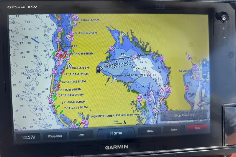 Slide: The Image of Garmin GPS map display on a 2002 Sea Ray 380 Sundancer, showing nautical navigation details. - 47