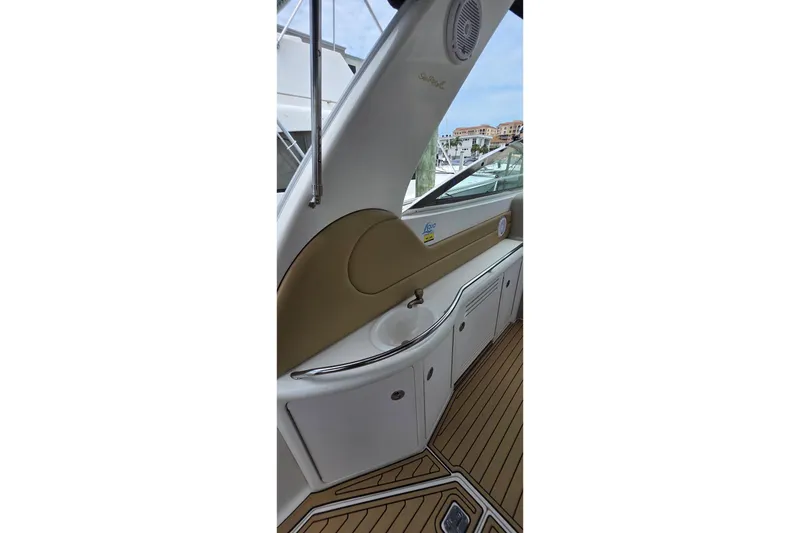 Slide: The Image of Interior view of 2002 Sea Ray 380 Sundancer yacht with sink and cabinetry. - 60