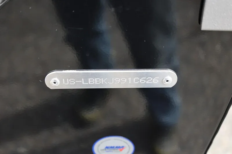 Slide: The Image of Hull identification number on 2026 Lund 1875 Impact XS Sport boat. - 15