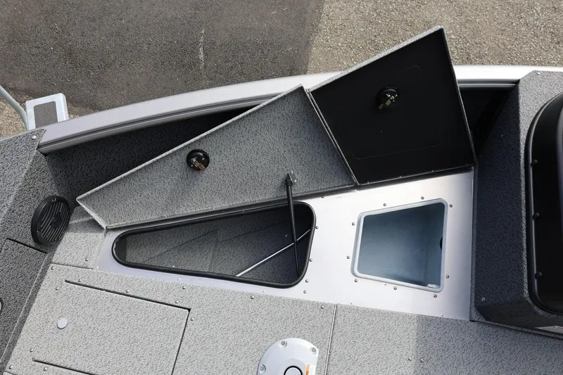 Slide: The Image of 2026 Lund 1875 Impact XS Sport boat interior storage compartments. - 46