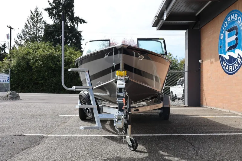 Slide: The Image of 2026 Lund 1875 Impact XS Sport boat on trailer at Bjornson Marine. - 6