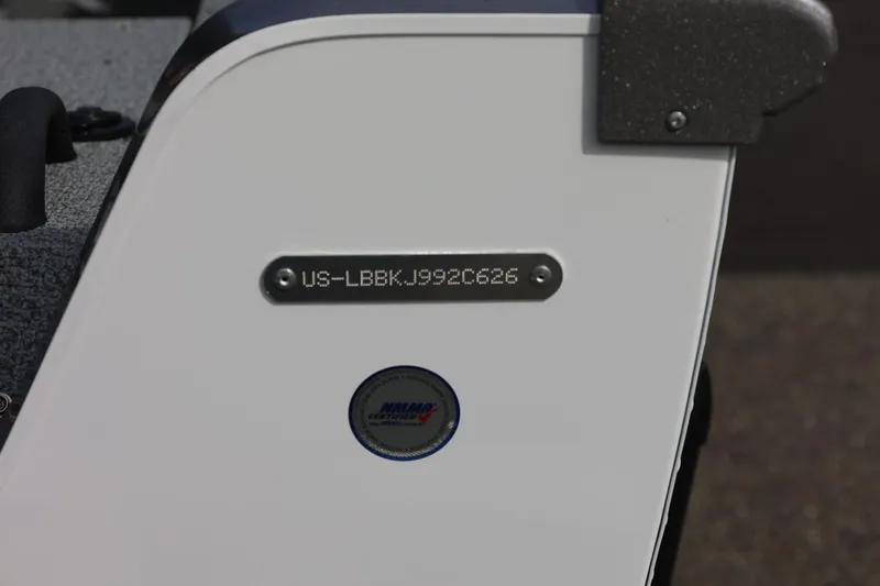 Slide: The Image of 2026 Lund 1875 Impact XS Sport boat with visible hull identification number. - 13