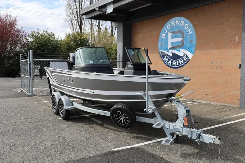Slide: The Image of 2026 Lund 1875 Impact XS Sport boat on trailer at Bjornson Marine. - 3
