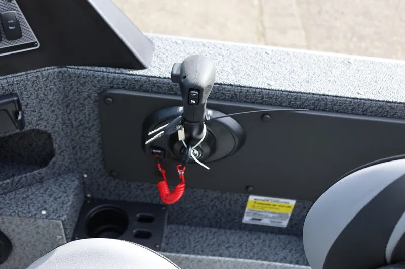 Slide: The Image of 2026 Lund 1875 Impact XS Sport boat throttle control with key and safety lanyard. - 33
