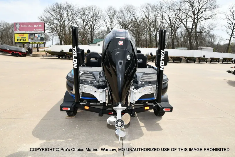 Slide: The Image of Rear view of a 2023 Nitro Z20 Pro boat on a parking lot. - 19