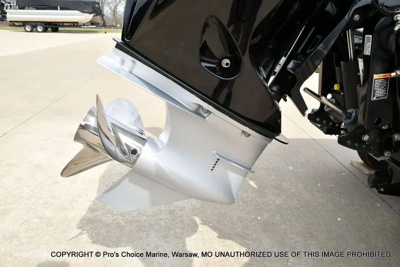 Slide: The Image of 2023 Nitro Z20 Pro outboard motor with shiny propeller. - 25