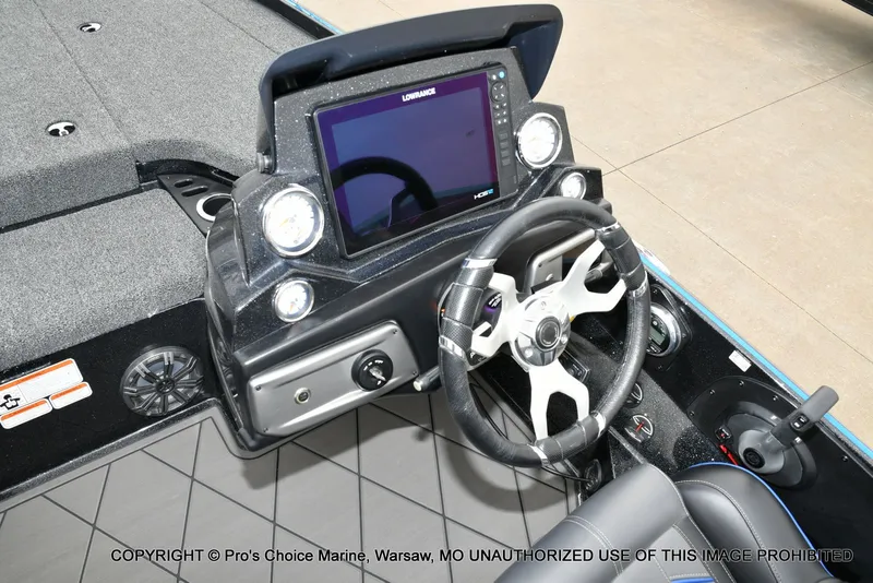 Slide: The Image of Nitro Z20 Pro 2023 boat console with steering wheel and display. - 48