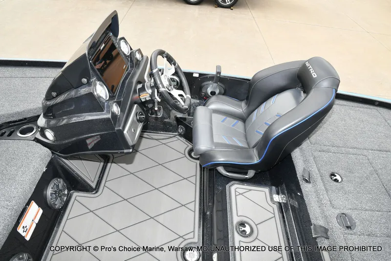 Slide: The Image of Interior of 2023 Nitro Z20 Pro with console and seat. - 49
