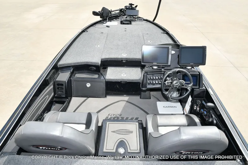 Slide: The Image of Interior view of 2025 Triton 21XP boat with modern electronics. - 10