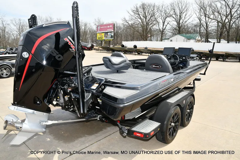 Slide: The Image of Triton 21XP 2025 boat with powerful outboard motor. - 20