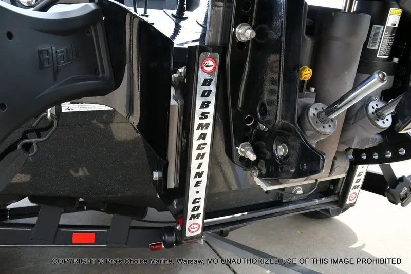 Slide: The Image of Close-up of a Triton 21XP boat mechanism, year 2025. - 25