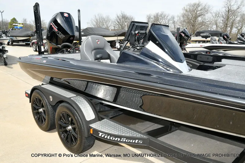 Slide: The Image of 2025 Triton 21XP boat on trailer, side view. - 3