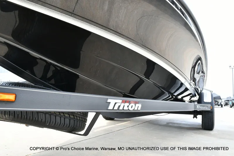 Slide: The Image of Triton 21XP boat on trailer, 2025 model, side view. - 34