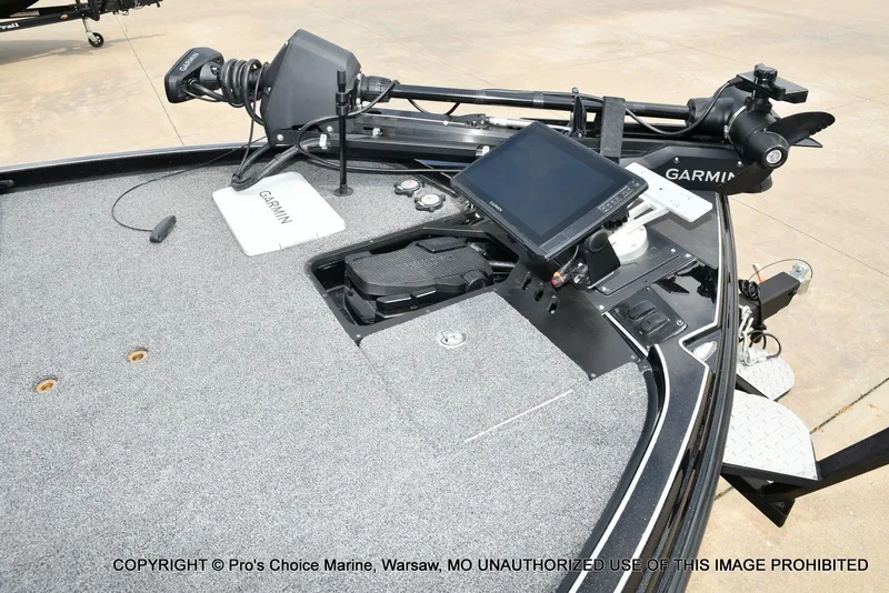 Slide: The Image of Triton 21XP 2025 boat with Garmin technology and control console. - 35