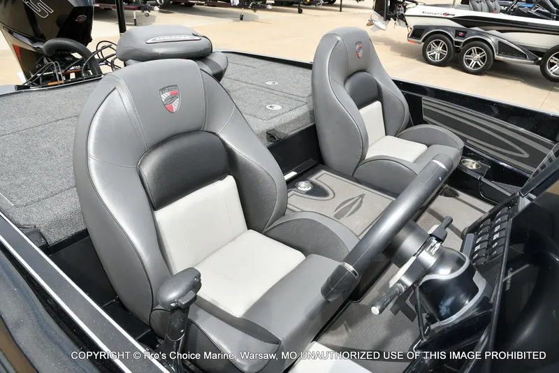 Slide: The Image of Interior of 2025 Triton 21XP with gray leather seats. - 37