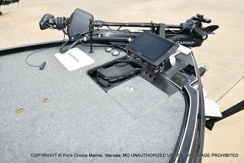 Slide: The Image of Triton 21XP 2025 with Garmin technology on gray deck. - 4