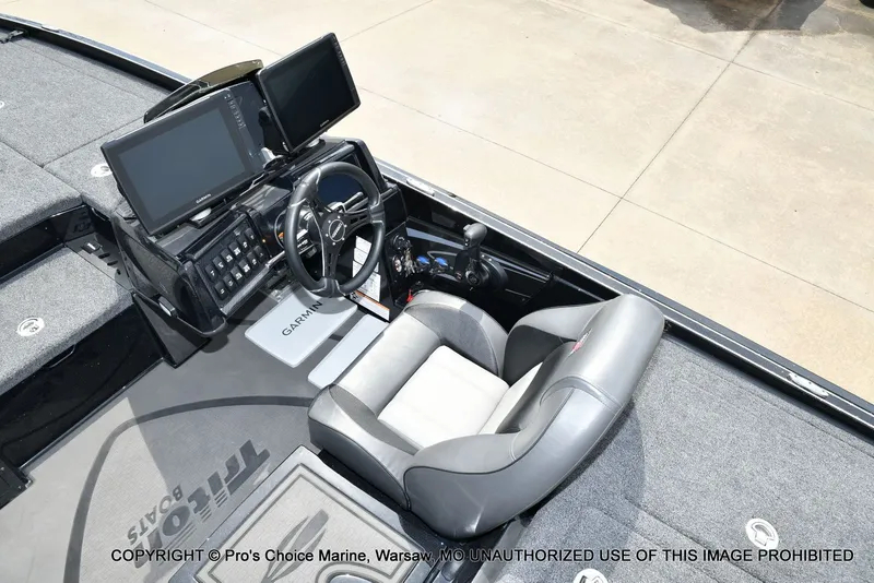 Slide: The Image of Interior of 2025 Triton 21XP with modern control console. - 43