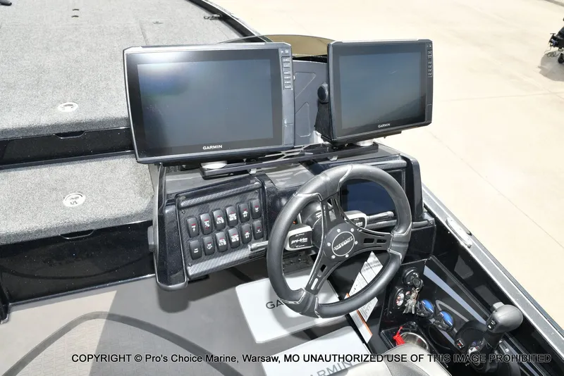 Slide: The Image of Interior view of 2025 Triton 21XP boat with Garmin screens. - 44