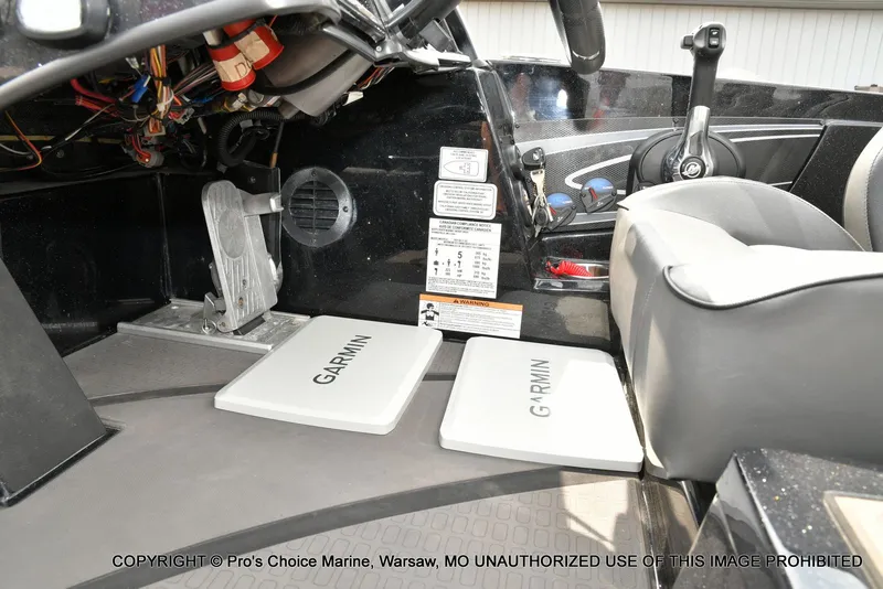Slide: The Image of Interior of a 2025 Triton 21XP with Garmin devices. - 46