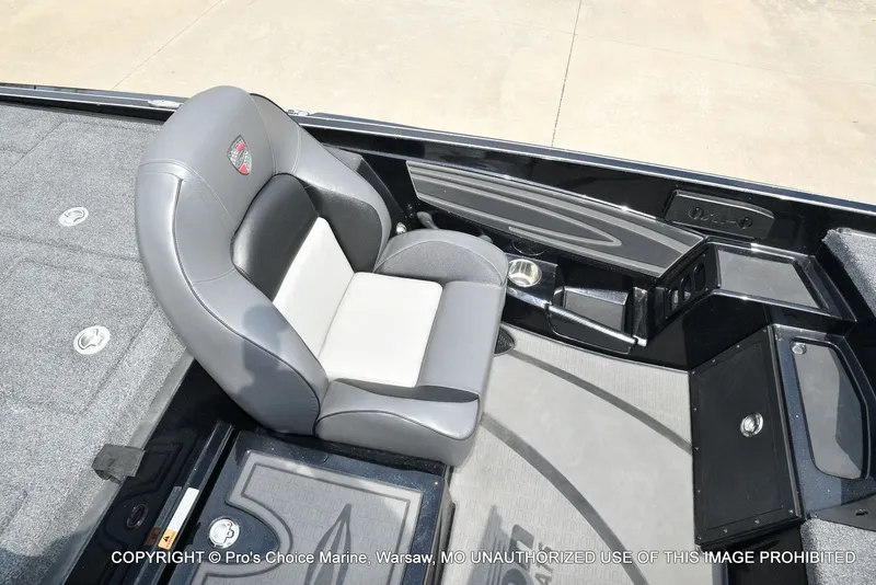 Slide: The Image of Interior of 2025 Triton 21XP with gray seat and storage. - 47