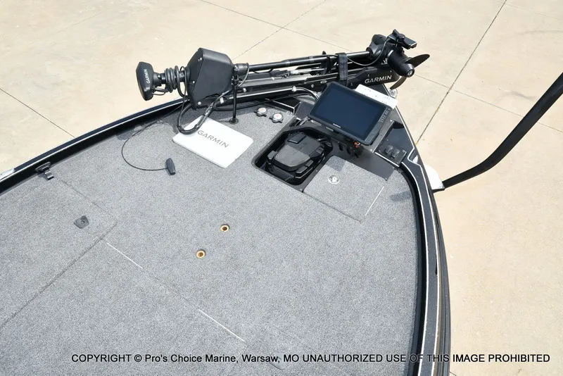 Slide: The Image of Triton 21XP 2025 boat with Garmin equipment on gray deck. - 49