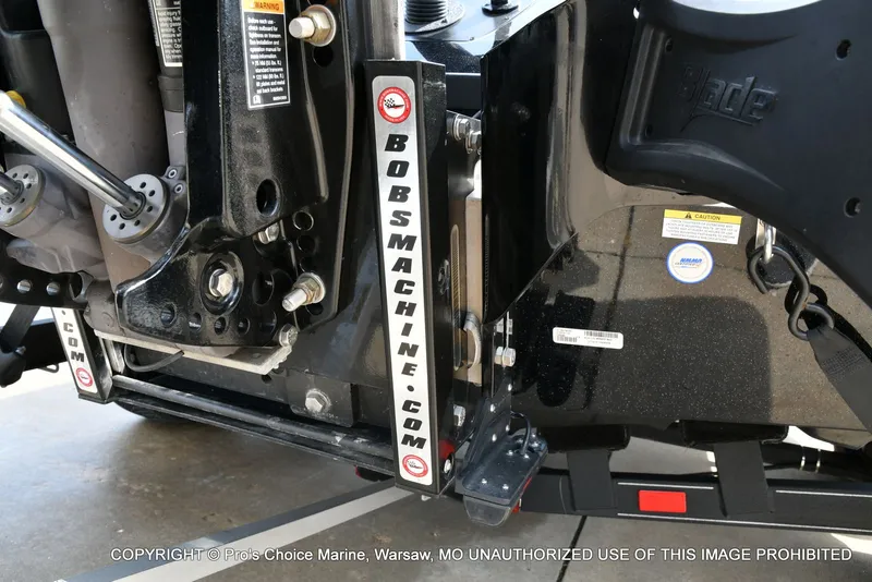 Slide: The Image of Close-up of a 2025 Triton 21XP boat transom. - 8