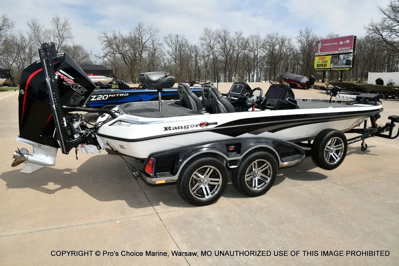 Slide: The Image of 2023 Ranger Z521R Cup boat with 300 Pro-XS engine on trailer. - 21