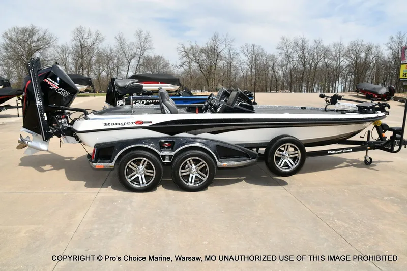 Slide: The Image of 2023 Ranger Z521R Cup boat with 300 Pro-XS engine on trailer. - 22