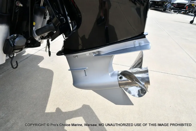 Slide: The Image of 2023 Ranger Z521R Cup boat motor with shiny propeller. - 25