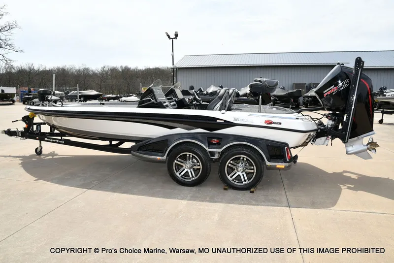 Slide: The Image of 2023 Ranger Z521R Cup boat with 300 Pro-XS engine on trailer. - 29