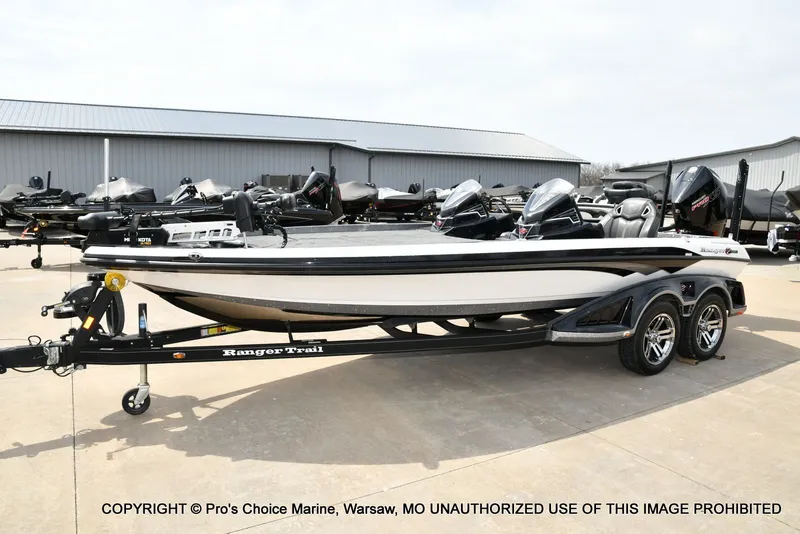 Slide: The Image of 2023 Ranger Z521R Cup boat on trailer outdoors. - 30