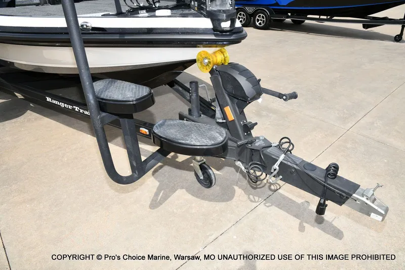 Slide: The Image of 2023 Ranger Z521R Cup boat trailer on concrete surface. - 35