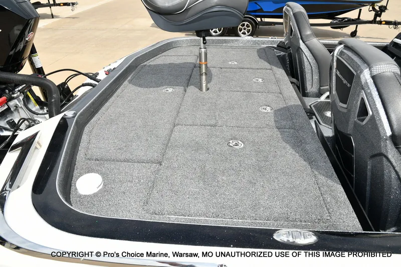 Slide: The Image of 2023 Ranger Z521R Cup boat interior with gray carpet flooring. - 41
