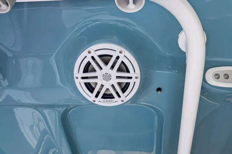 Slide: The Image of JL Audio speaker on Sea Hunt Ultra 245 SE boat, 2026 model. - 13