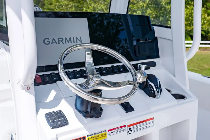 Slide: The Image of Sea Hunt Ultra 245 SE 2026 helm with Garmin display. - 17