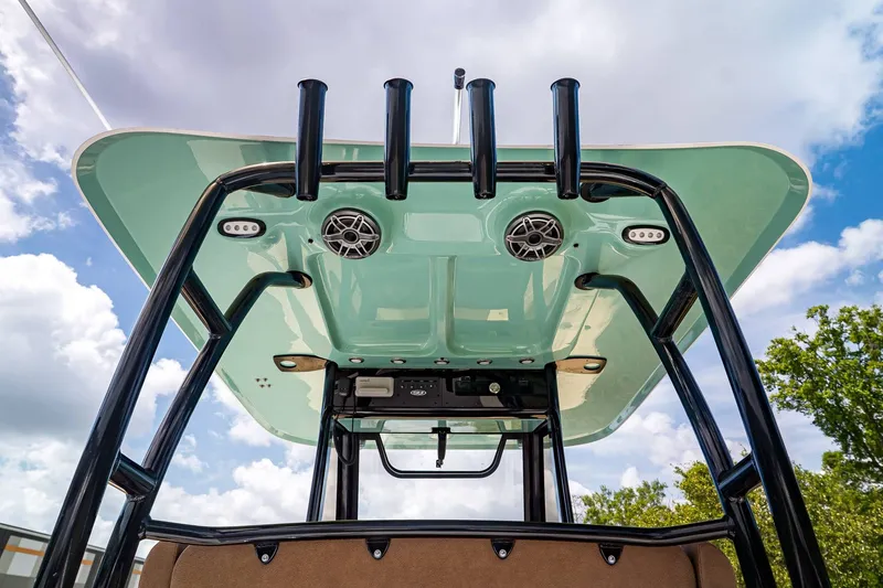 Slide: The Image of Sea Hunt ULTRA 285CB 2026, boat roof with speakers and mounts. - 13