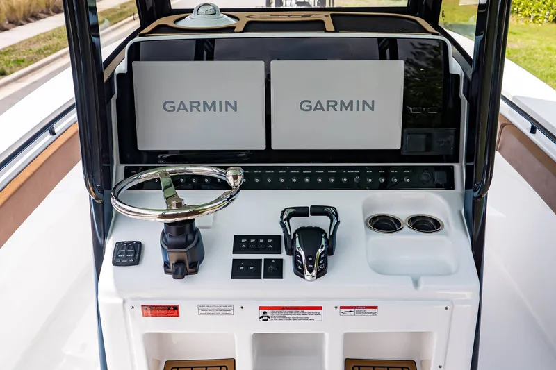 Slide: The Image of Sea Hunt ULTRA 285CB 2026 helm with Garmin displays. - 15