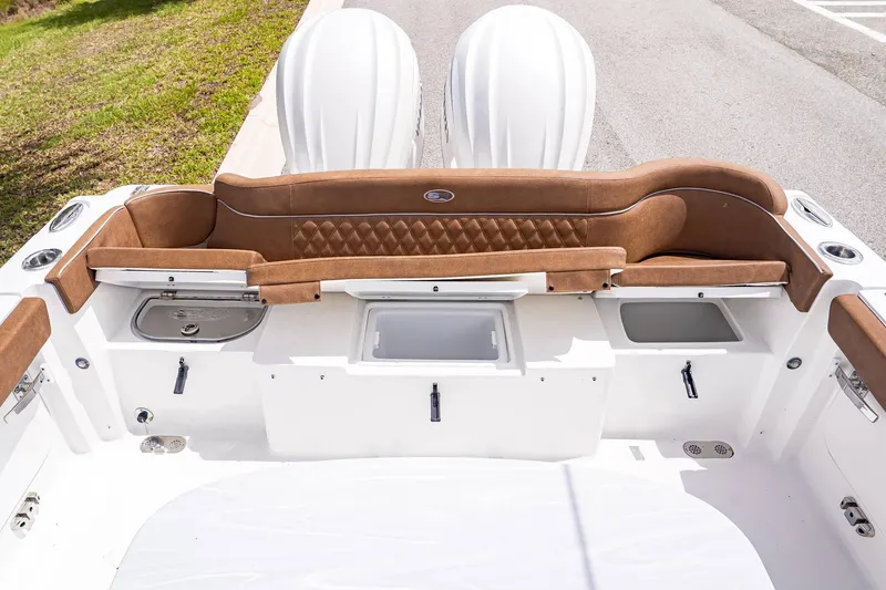 Slide: The Image of Interior of 2026 Sea Hunt ULTRA 285CB with brown upholstery. - 8